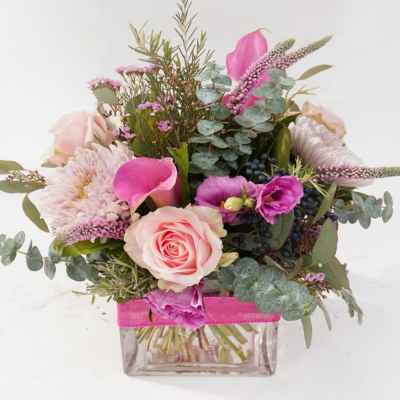Serenity - Beautiful Vase Arrangement consisting of Square Glass Vase with delightful Roses, Calla Lillies, Chrysanthemums, Veronica's.