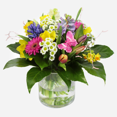 You're Wonderful - A spring hand tied in a glass vase in a lovely mix of flowers and colours.